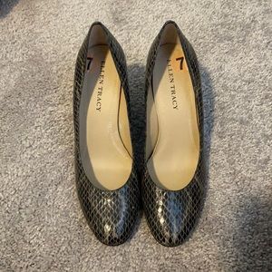 Never worn wedge heel “snakeskin” pattern